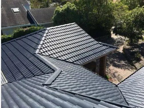 The same hip roof after full restoration in charcoal