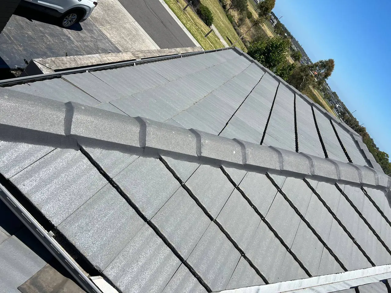 Concrete tile roof restored and resprayed in charcoal, Melbourne — project 1