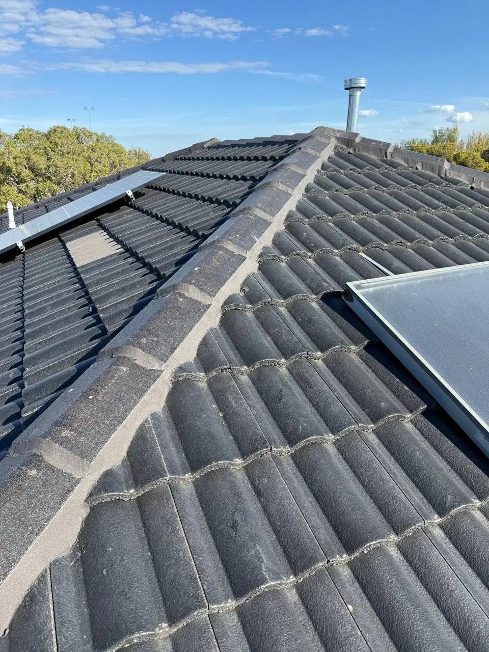 Concrete tile roof restored and resprayed in charcoal, Melbourne — project 14